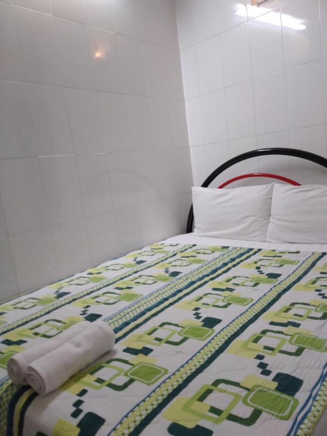 Guest House Uttrang Thành Pho Ho Chí Minh Esterno foto